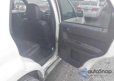 2009 Ford Escape Limited z USA, uszkodzony, nr VIN 1FMCU04G49KC10851